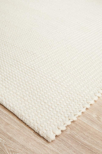 NATURAL CARLO FELTED WOOL BLEND RUG
