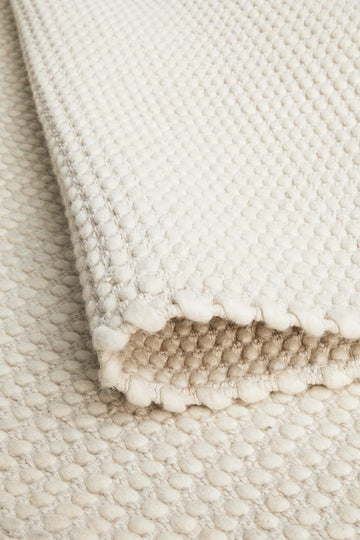 NATURAL CARLO FELTED WOOL BLEND RUG